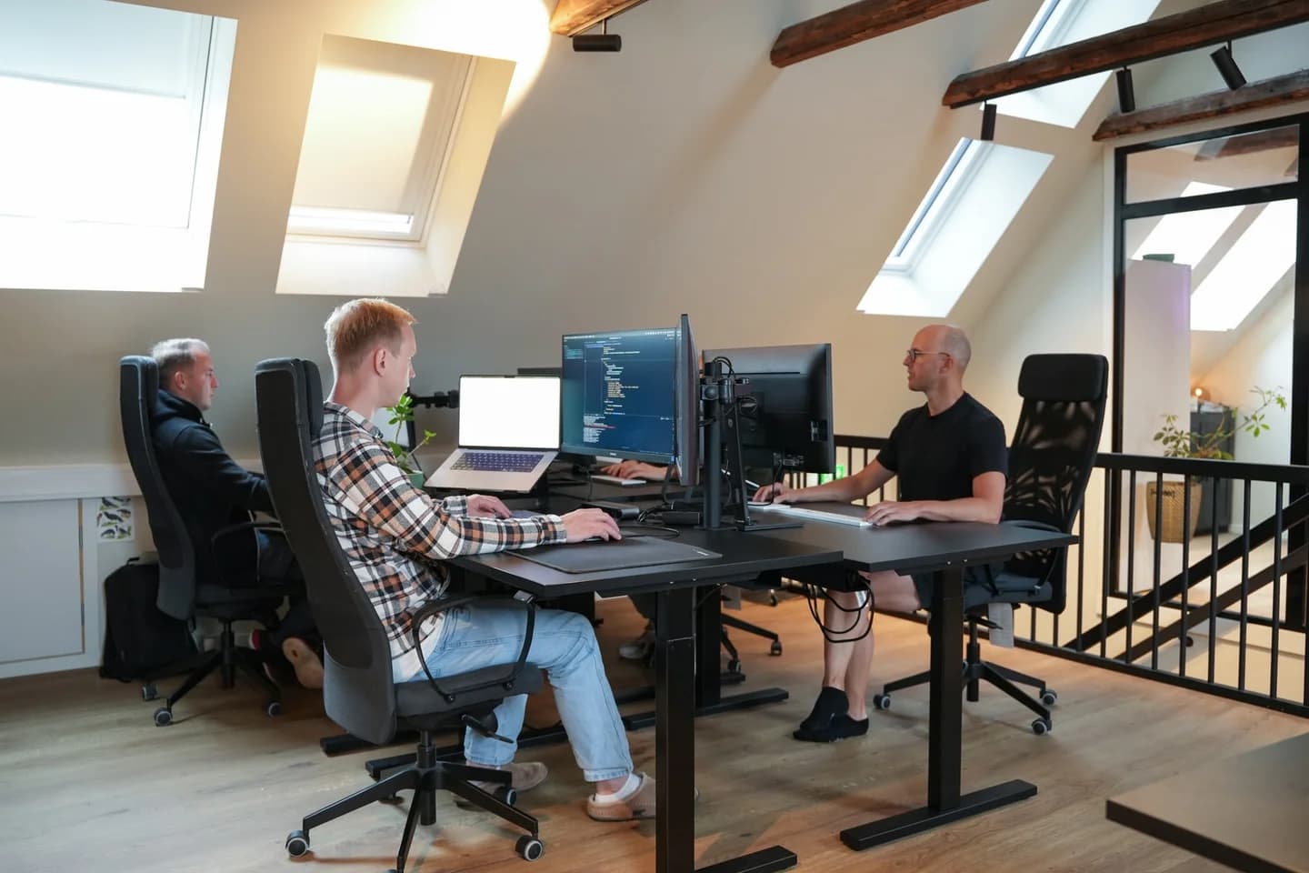 Colleagues working together in our Norway office
